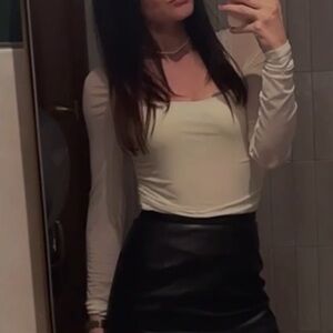 Women’s bodysuit by “And now this”.